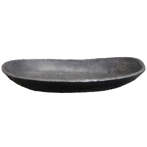 A black oval melamine serving bowl with a grey rim.