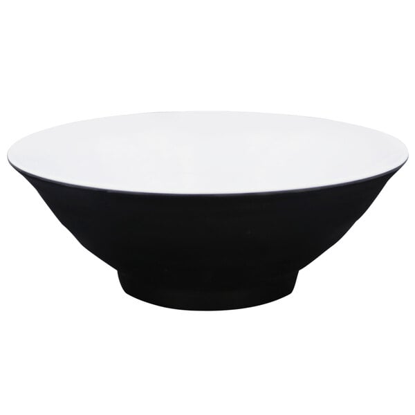 A black bowl with a white rim.