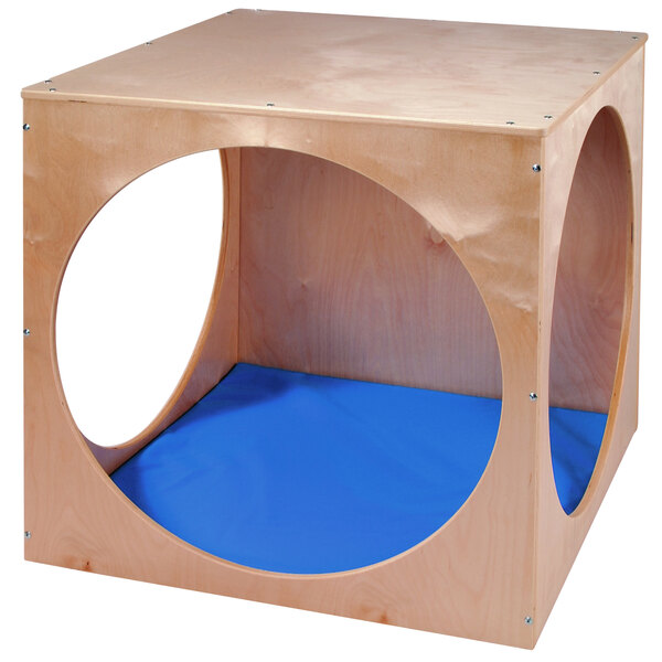 A blue vinyl floor mat with a white oval in a wooden box.