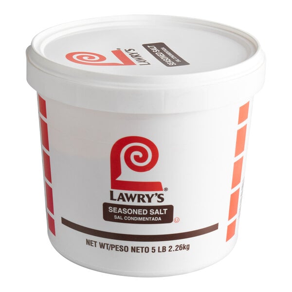 A white plastic tub with a lid, labeled 'Lawry's Seasoned Salt' and marked with a net weight of 5 lb (2.26 kg).