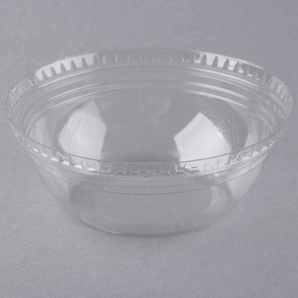 A clear plastic container with a round lid on it.