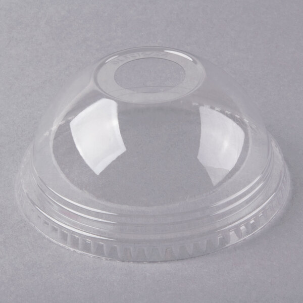 a clear plastic container with a hole
