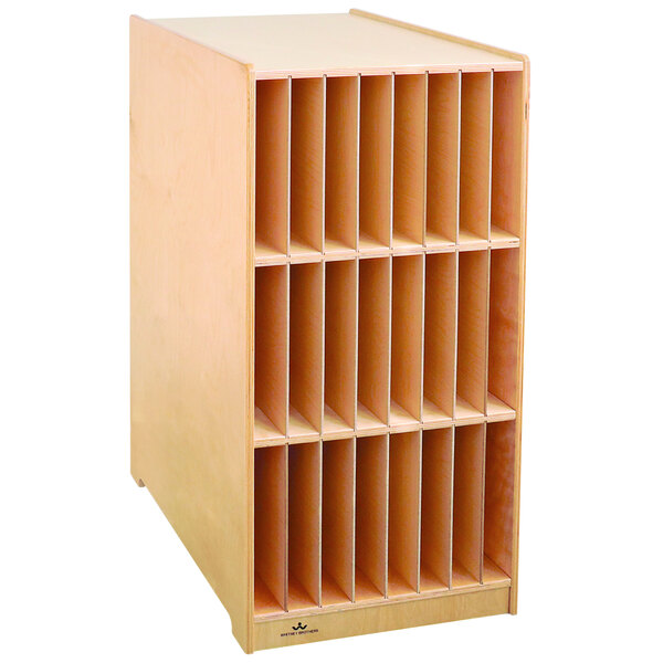 A Whitney Brothers wooden communication station with removable partitions.