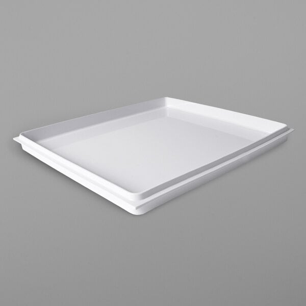 A white Elite Global Solutions food pan lid on a white tray.