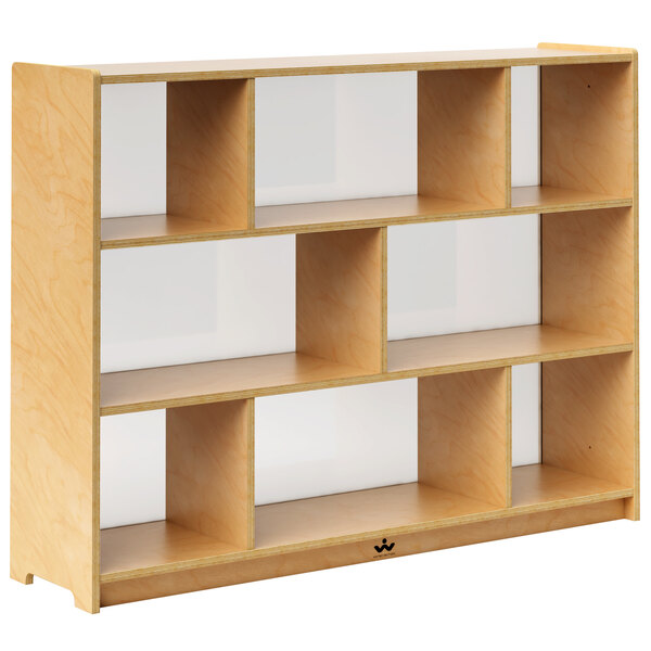 A Whitney Brothers wooden storage cabinet with white acrylic-backed shelves.