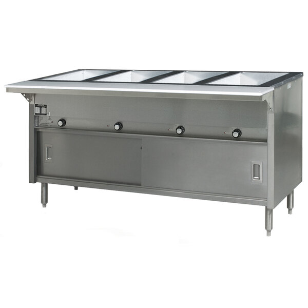 A large stainless steel Eagle Group hot food table with sliding doors on a counter.