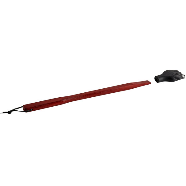 An Outset rosewood-handled BBQ brush with black silicone bristles.