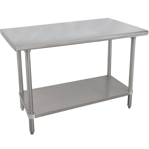 An Advance Tabco stainless steel work table with a shelf.