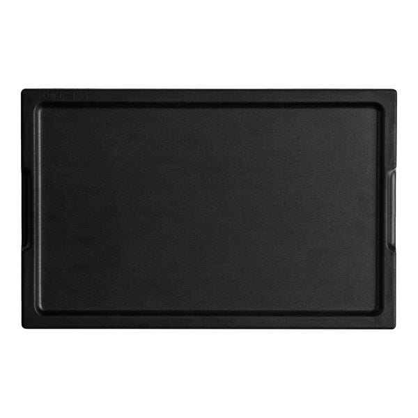 A black rectangular melamine display board with faux acacia wood design and handles.