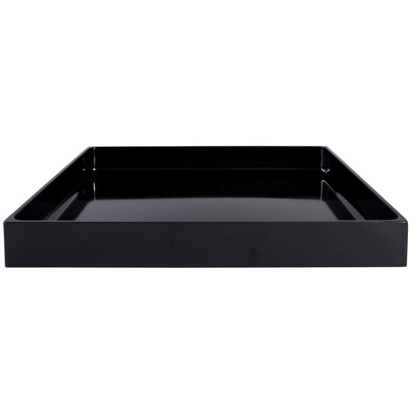 A black rectangular Elite Global Solutions melamine food pan on a table in a salad bar.