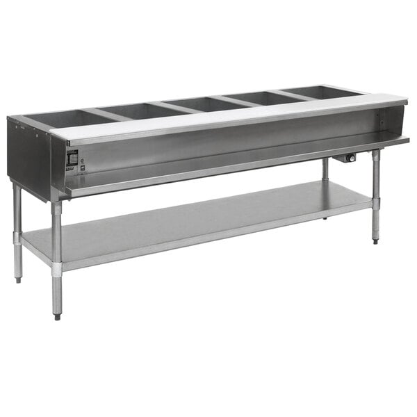 An Eagle Group stainless steel electric water bath steam table on a metal table.