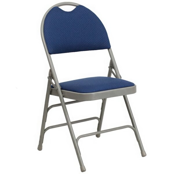 A navy blue Flash Furniture metal folding chair with a padded seat.