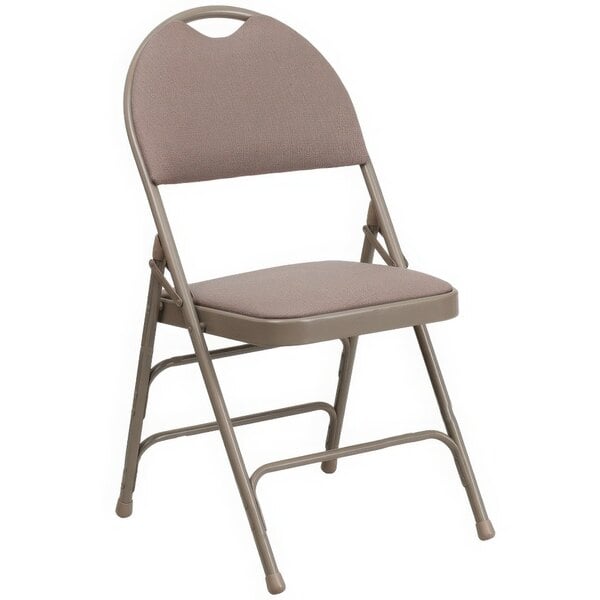 A Flash Furniture beige metal folding chair with a padded seat.