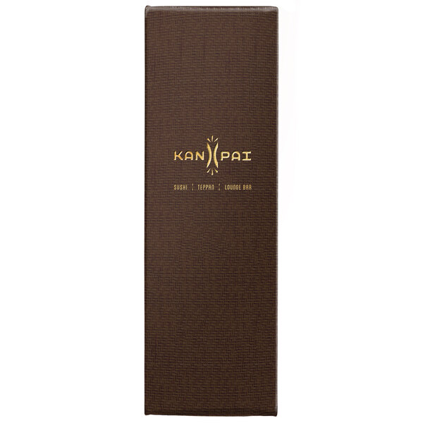 A brown box with a Menu Solutions logo in gold text on a brown surface.