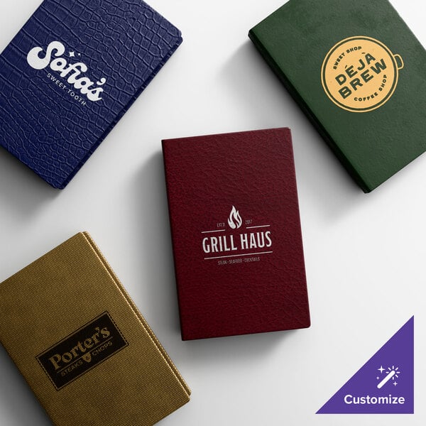 A set of four customizable quad panel booklet menu covers in various colors and textures, each featuring different restaurant logos on the front.