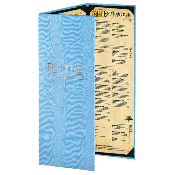 A customizable blue Menu Solutions 3 view menu cover on a table in a seafood restaurant.