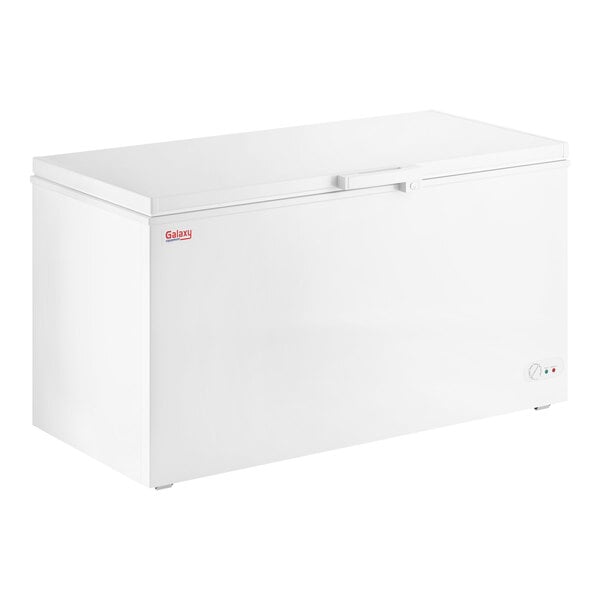 A white commercial chest freezer with a 15.9 cubic foot capacity.