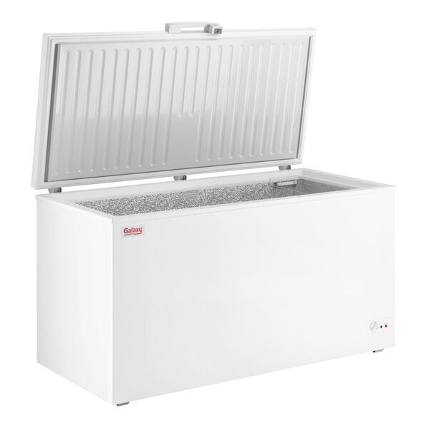 A large white commercial chest freezer with an open top lid and a 15.9 cubic foot capacity.