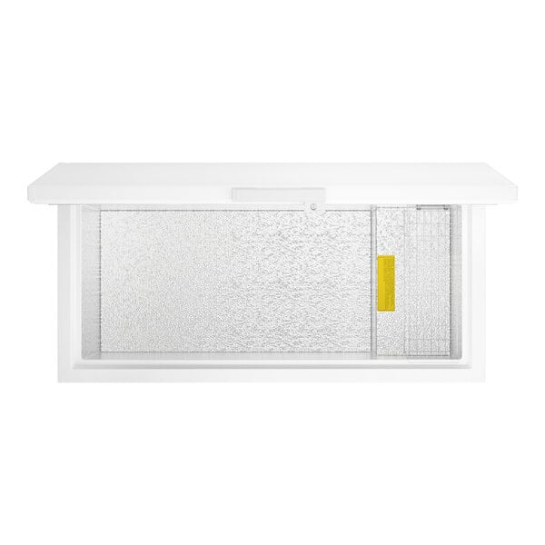 A white commercial chest freezer with a sliding glass lid and a 15.9 cubic foot capacity.