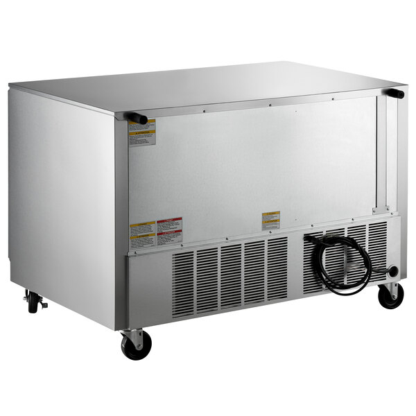 A large silver Beverage-Air undercounter freezer with wheels.
