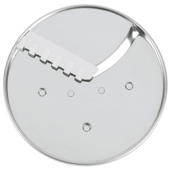 a circular metal object with a metal handle