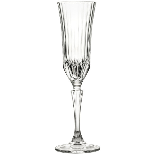 A close-up of a 10 Strawberry Street Adagio champagne flute with a clear stem.