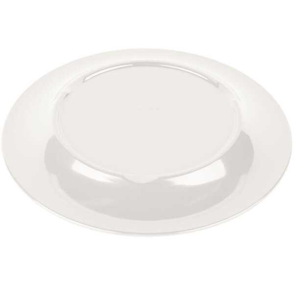 A white Carlisle melamine plate with a round rim.