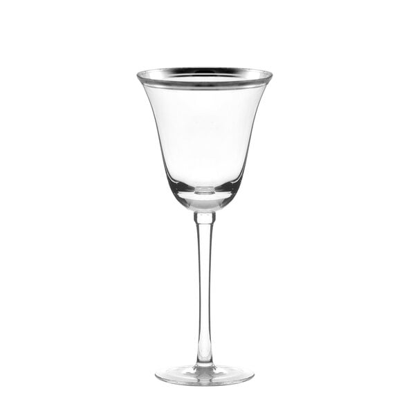 A clear wine glass with a long stem and silver band.