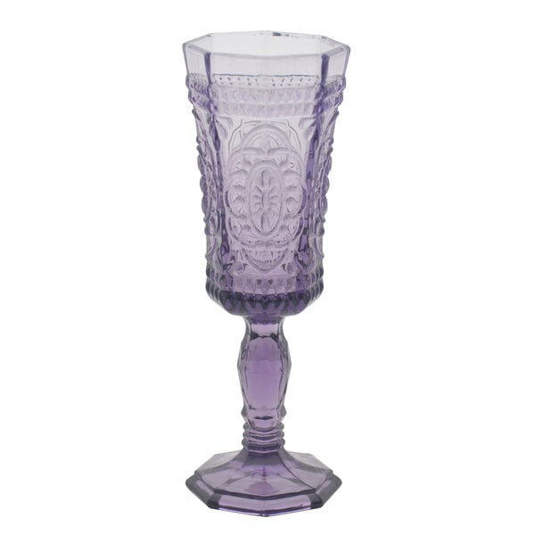 A 10 Strawberry Street Vatican amethyst champagne flute with a design on it.