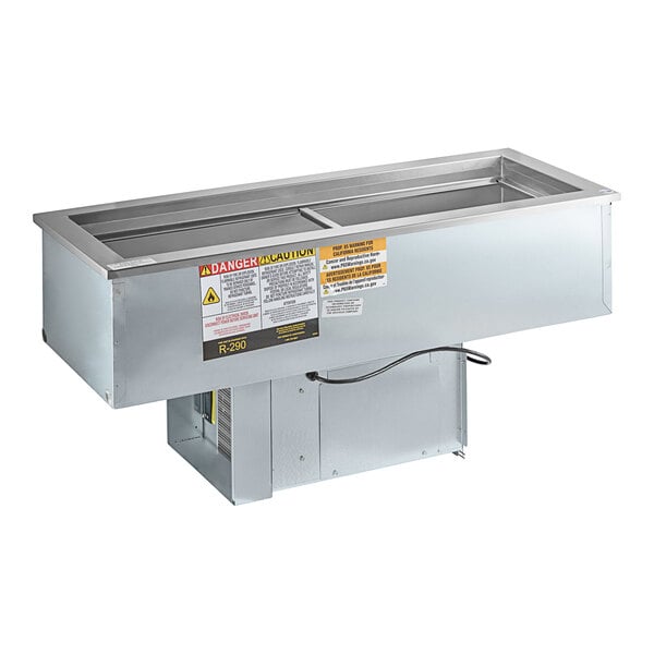 A Delfield stainless steel narrow drop-in refrigerated cold food well on a counter.