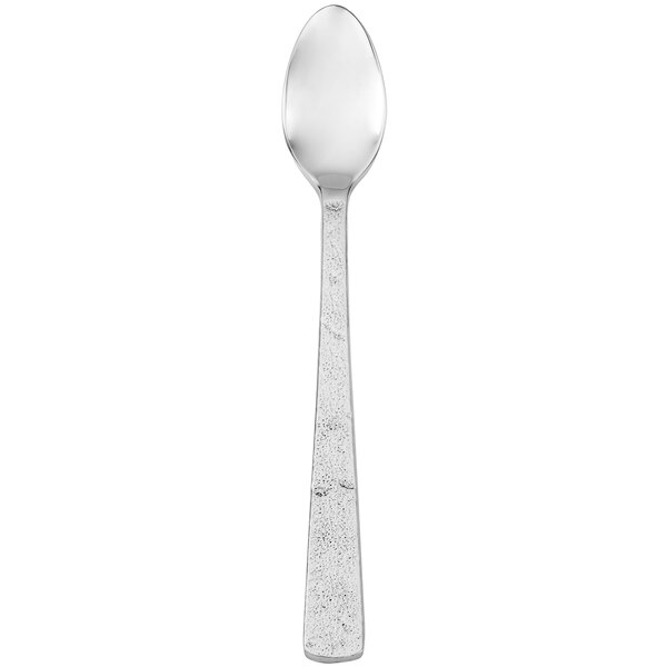 A silver Walco Vestige iced tea spoon with a white handle.