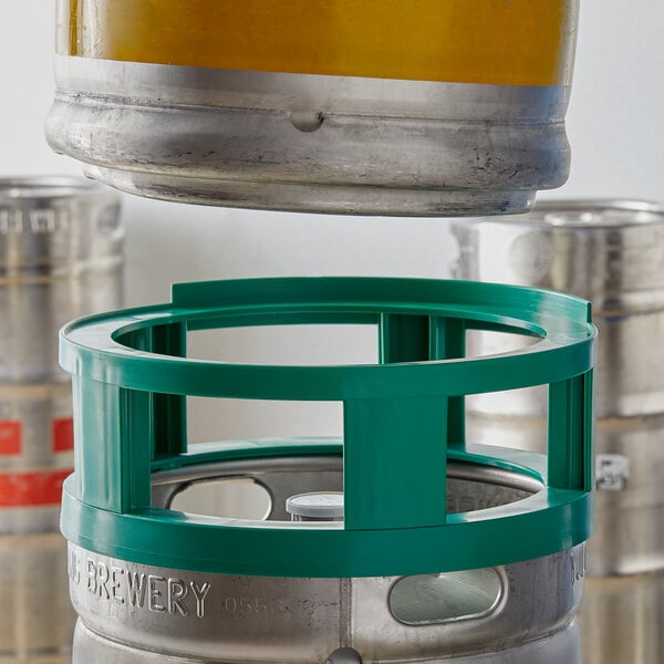 A Regency Keg Spacer on a table with a green keg on top.