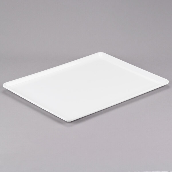 A white rectangular tray on a gray background.