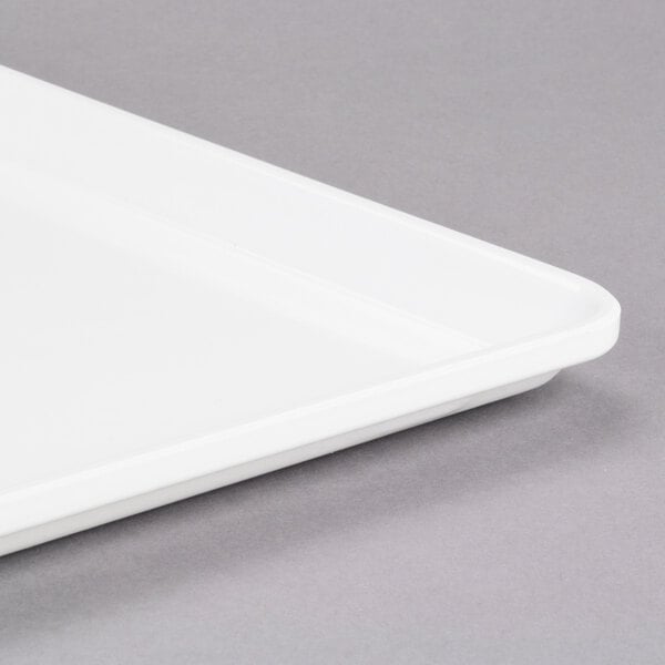 A white Cambro dietary tray with a lid on it.