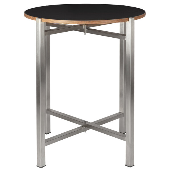 A Bon Chef round table top with a black surface.