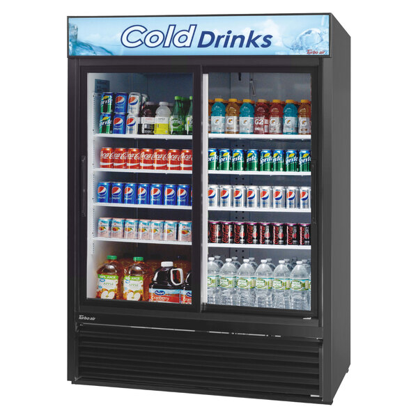 A Turbo Air refrigerated merchandiser with drinks inside.