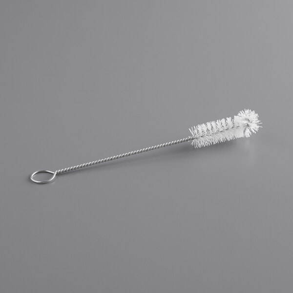 a long silver wire with a white handle