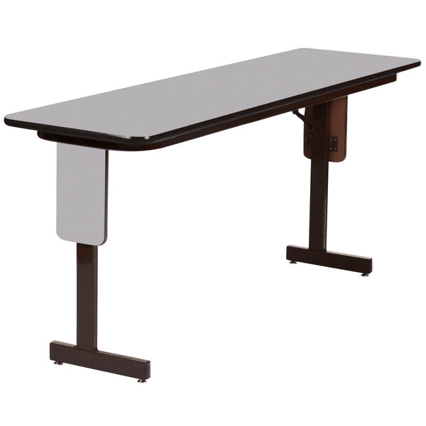 A rectangular Correll seminar table with a black frame.