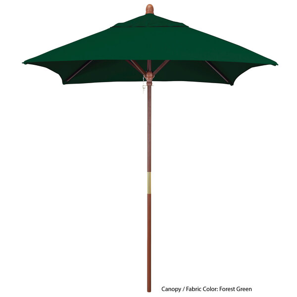A green California Umbrella with a wooden pole.