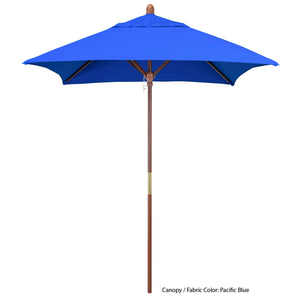 A blue California Umbrella with a Sunbrella canopy and wooden pole.