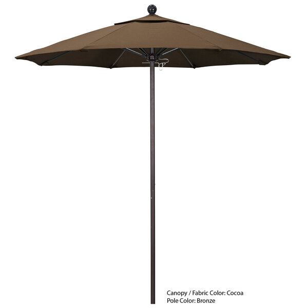 A brown umbrella with a Sunbrella canopy on an aluminum pole.