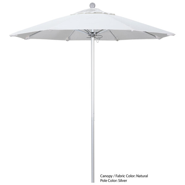 A white California Umbrella with a metal pole.
