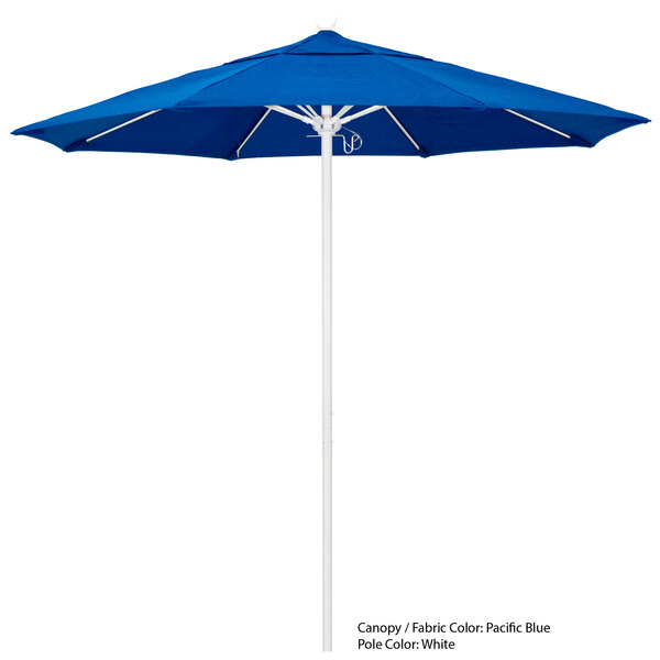 A blue California Umbrella with a white pole.