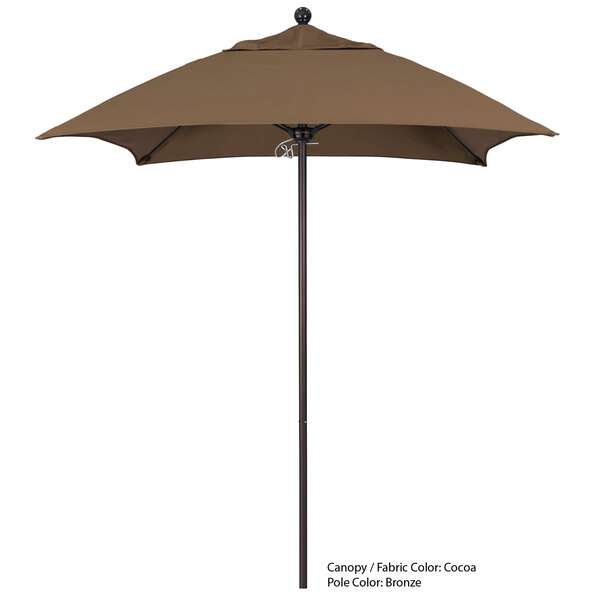 A brown California Umbrella with a round top and a black pole.