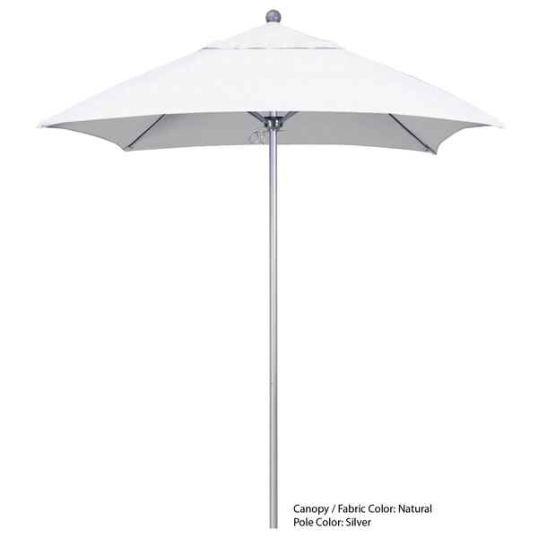 A white California Umbrella with a metal pole.