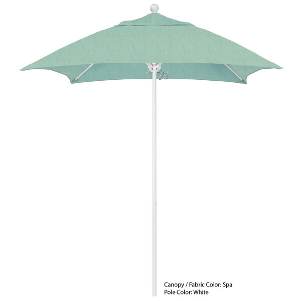 A white umbrella with a turquoise Sunbrella canopy.
