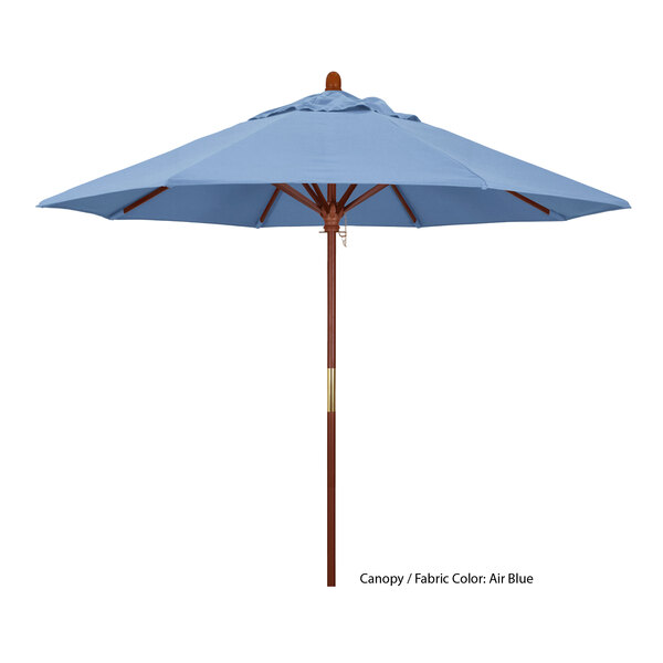 A blue California Umbrella with a brown wooden pole.