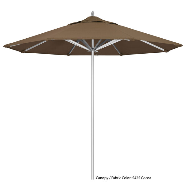 A brown California Umbrella with a white pole.