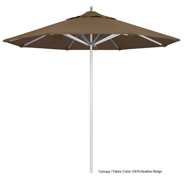 A close-up of a brown California Umbrella with a white pole.