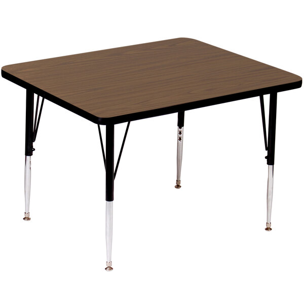 A Correll rectangular activity table with adjustable height legs and a walnut finish.